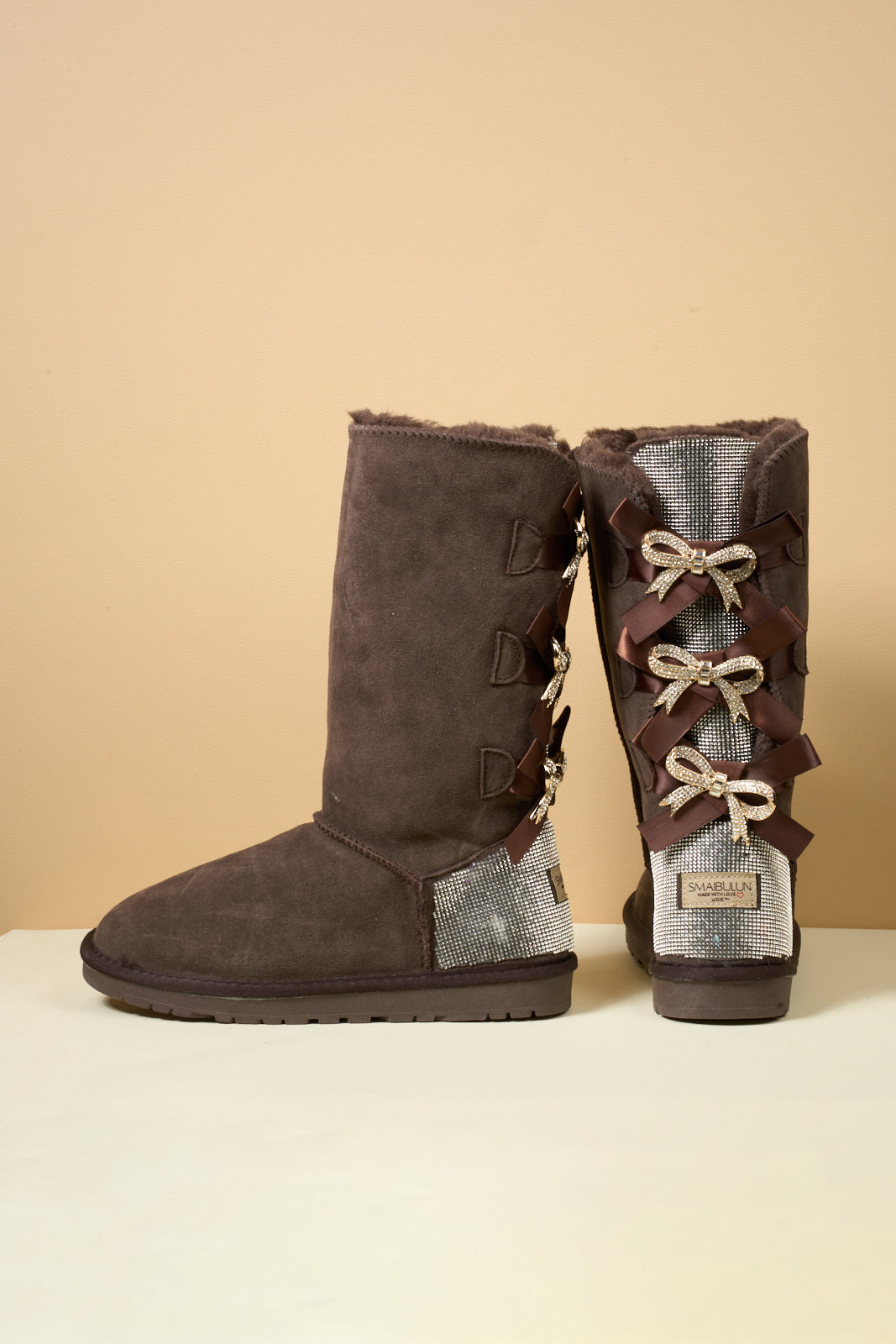 UGG Rhinestone Ribbon Tri-Tie Bow Suede Boots - Brown