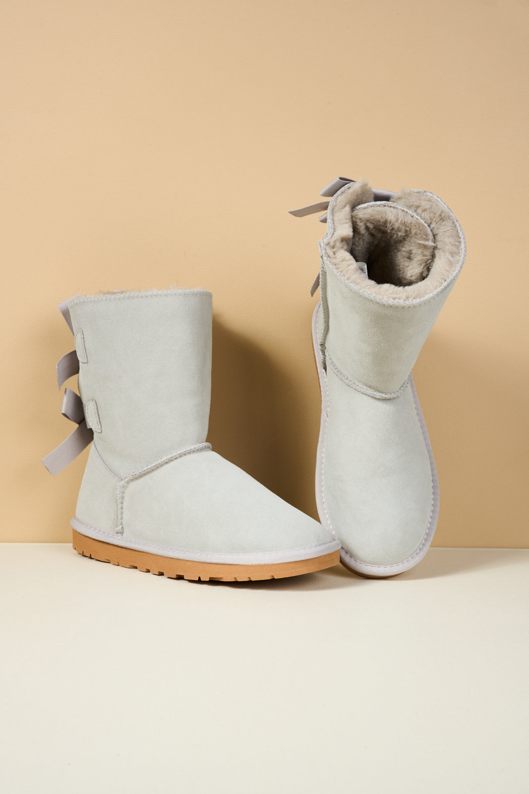 UGG Double Ballet Ribbon Bow Suede Shearling Boots - Pale