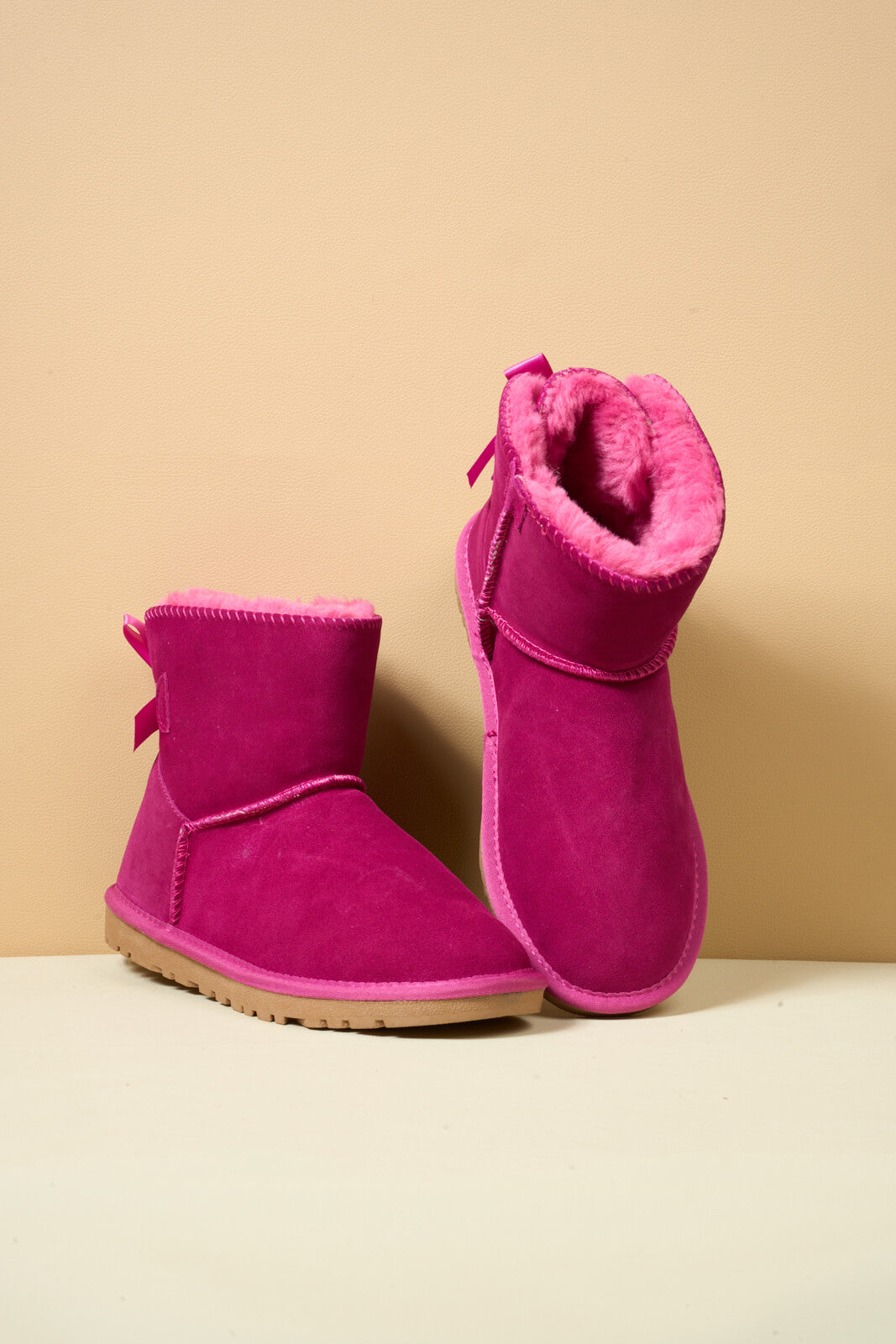 UGG Bailey Bow UGG Mini Boots - Fuchsia