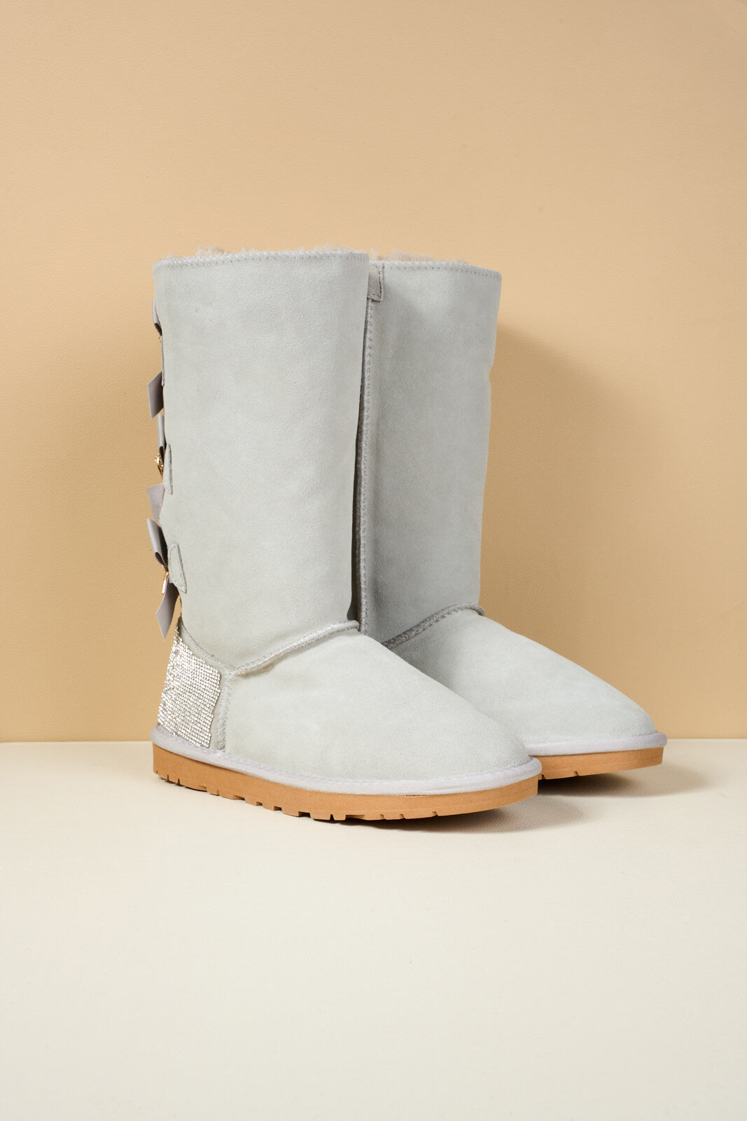 UGG Rhinestone Ribbon Tri-Tie Bow Suede Boots - Pale
