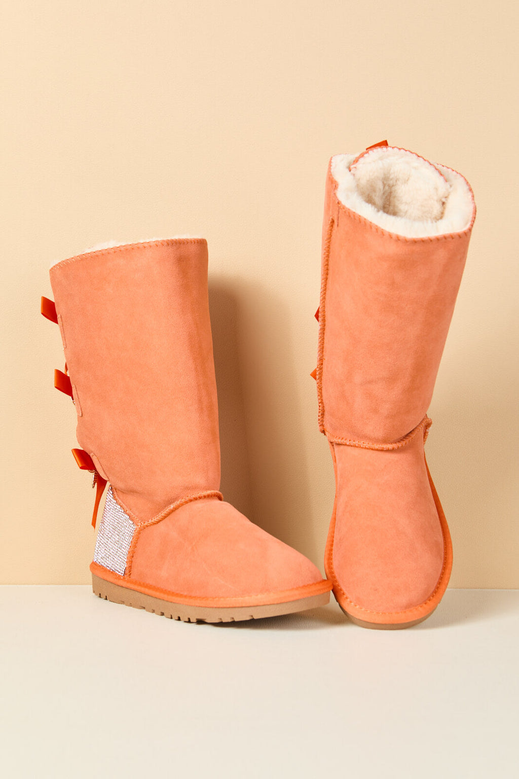 UGG Rhinestone Ribbon Tri-Tie Bow Suede Boots - Tangerine