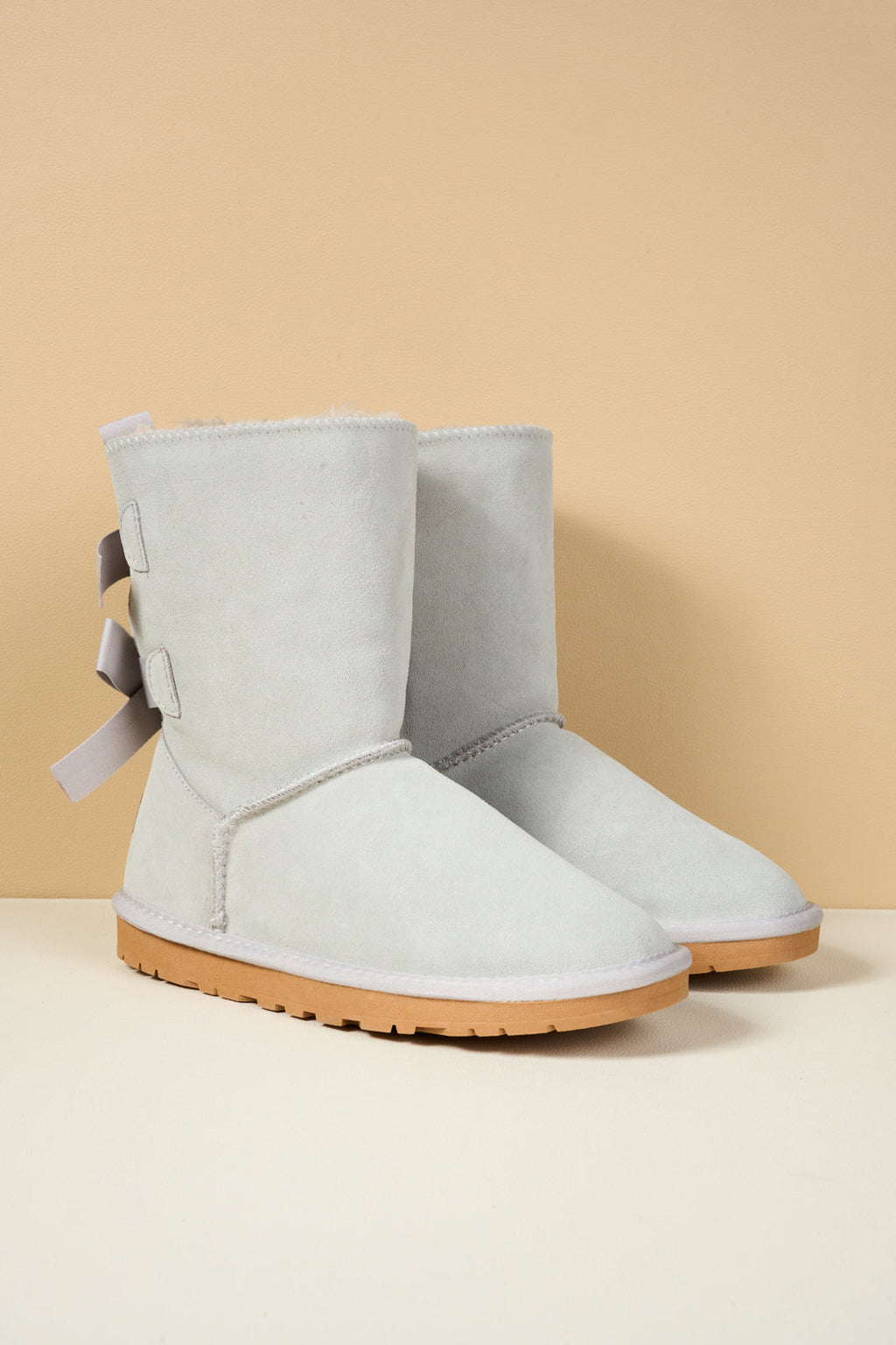 UGG Double Ballet Ribbon Bow Suede Shearling Boots - Pale