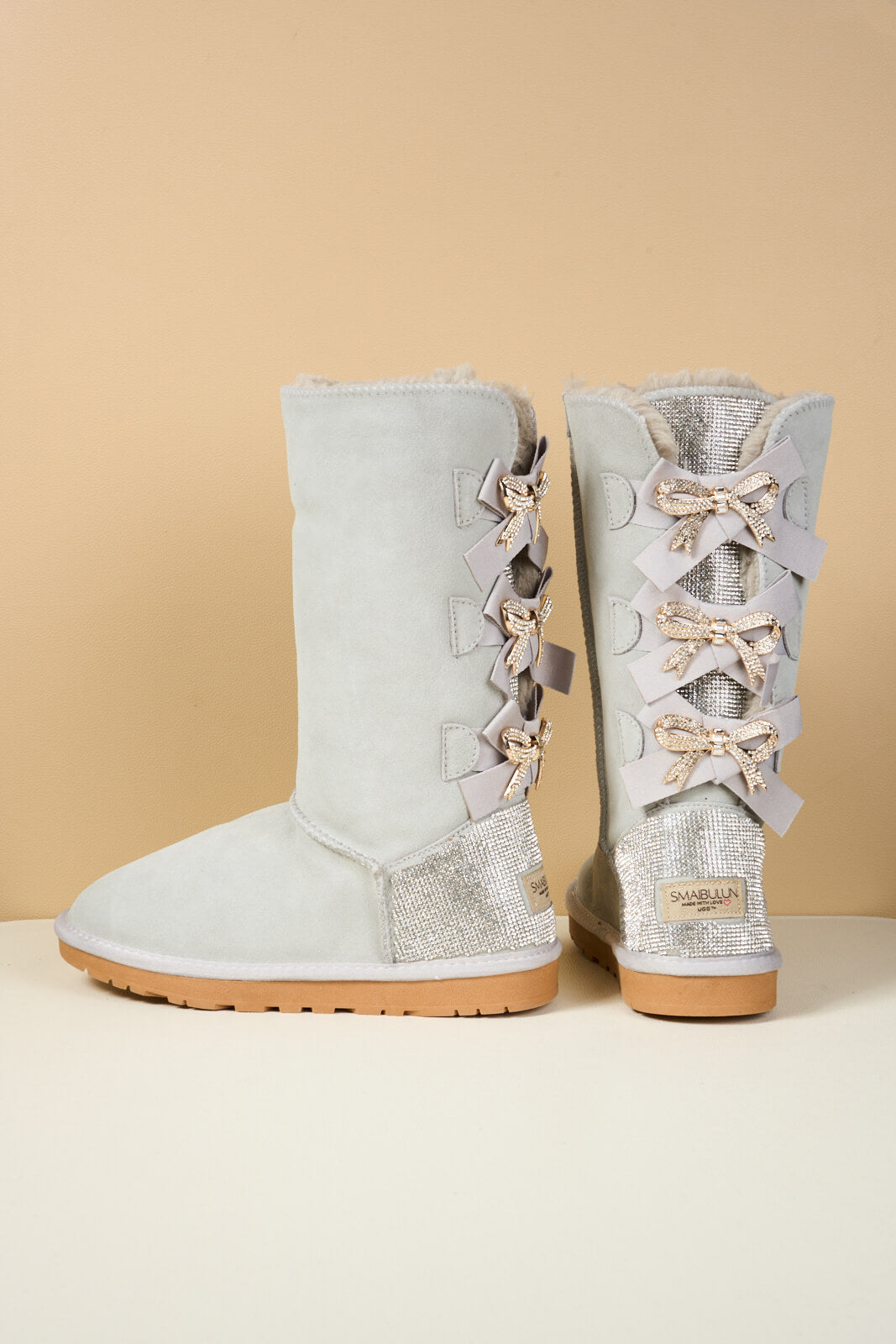 UGG Rhinestone Ribbon Tri-Tie Bow Suede Boots - Pale
